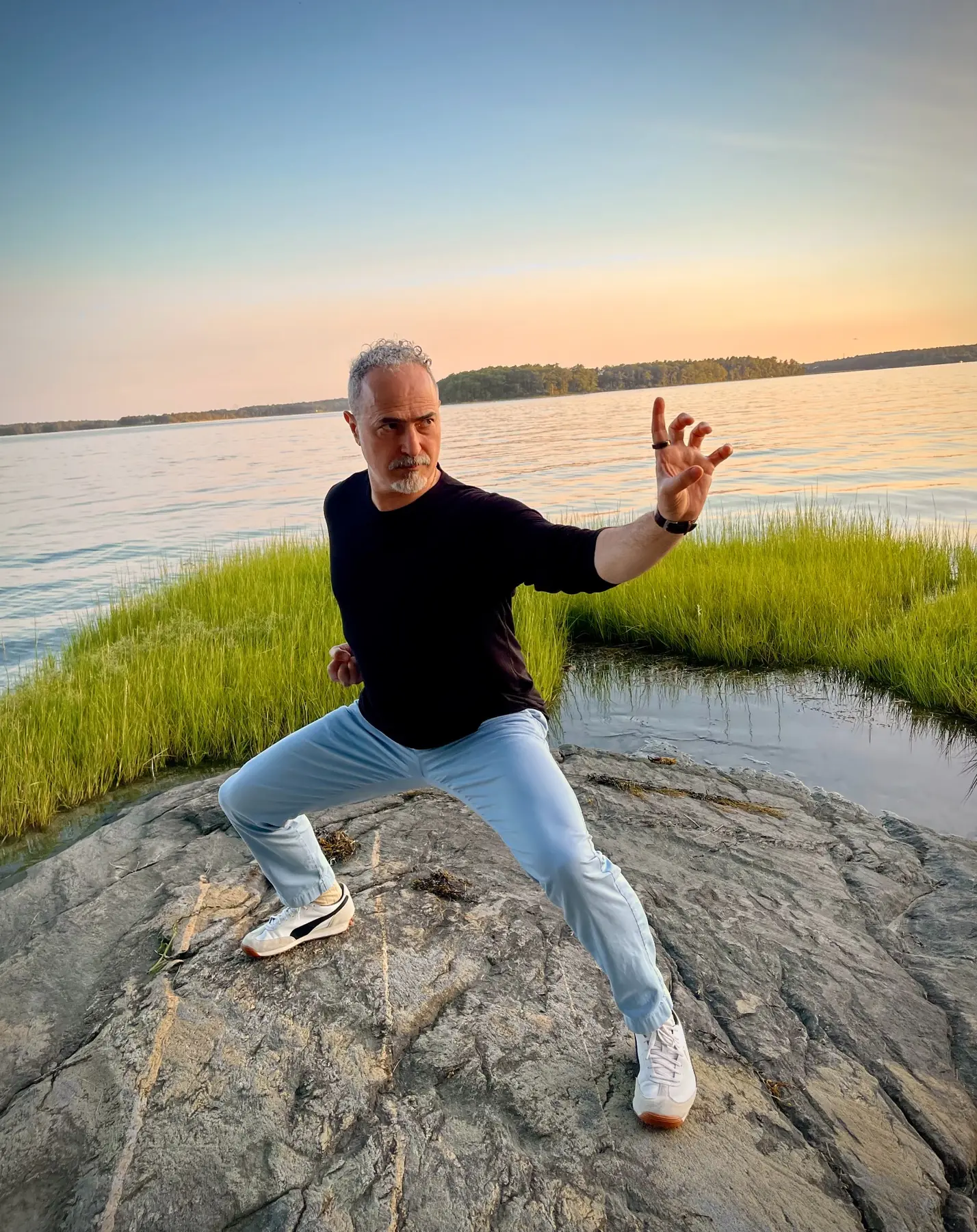 Jack Yee practicing Hung Gar beside the water in the Berkshire Mountains